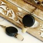 Black Earrings With A Brow..